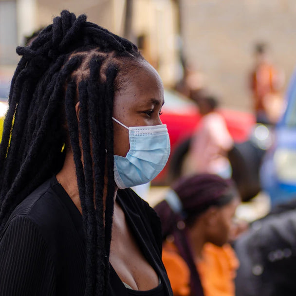 The Impact of Mask-Wearing on Community Health